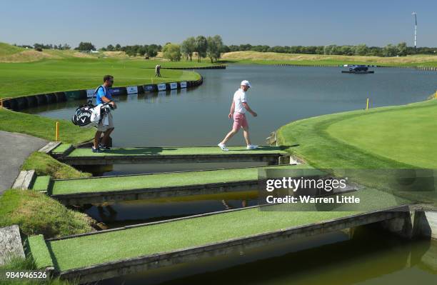 David Horsey of England walks onto the 18th green during a practice round ahead of the HNA Open de France at Le Golf National on June 27, 2018 in...