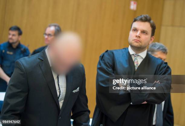 June 2018, Germany, Munich: The defendant Robert P. Standing beside his lawyer Benjamin Ruhlmann at the begin of the trial regarding the double...