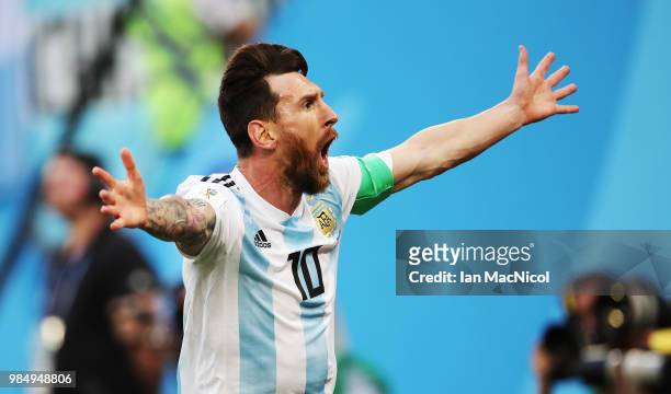 Lionel Messi of Argentina celebrates after scoring his team's opening goal during the 2018 FIFA World Cup Russia group D match between Nigeria and...