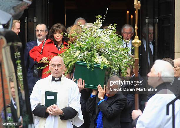 Nickolas Grace and the coffin bearers carry the coffin of Christopher Cazenove at his funeral held at St Paul's Church in Covent Garden on April 16,...