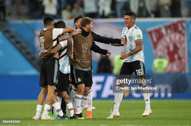 Marcos Rojo of Argentina celebrates at full time with team mates during the 2018 FIFA World Cup Russia group D match between Nigeria and Argentina at...