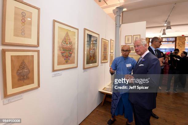 Prince Charles, Prince of Wales speaks to artist Ashley Nandong as he attends The Prince's Foundation School of Traditional Arts degree show in...