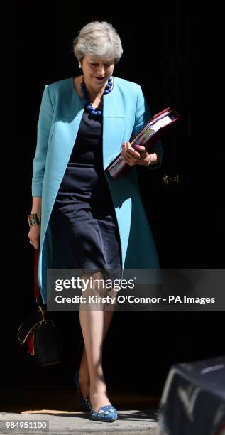 Prime Minister Theresa May leaves 10 Downing Street, London, for the House of Commons to face Prime Minister's Questions.