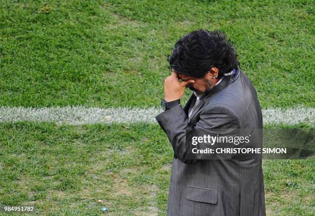 Argentina's coach Diego Maradona gestures during the 2010 World Cup quarterfinal football match against Germany at Green Point stadium in Cape Town,...