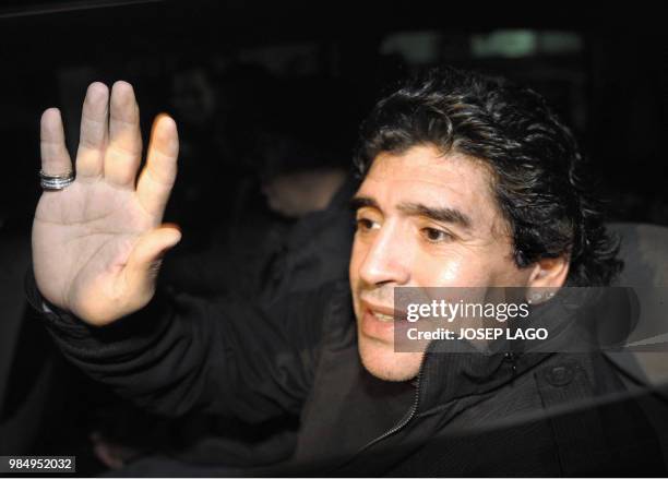 Argentinian football legend Diego Maradona, confirmed coach of Argentina's football team, leaves an hotel in Barcelona after a meeting with...