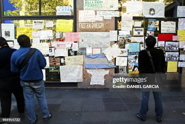 Posters, messages and dedications from supporters are displayed near the entrance of the clinic where football idol Diego Maradona is presently...