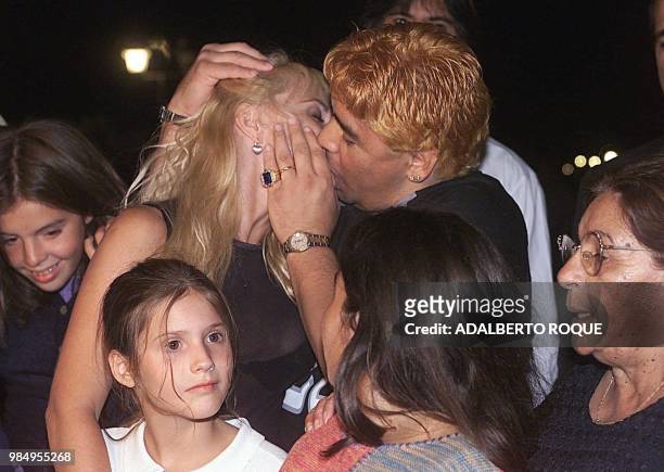 Ex-Argentine soccer player, Diego Armando Maradona kisses his wife, Claudia Villafane on the night of 22 January 2000 in the hotel Las Praderas in...