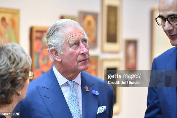Prince Charles, Prince of Wales listen to the 'PFSTA' director Dr. Khalid Azzam as he attends The Prince's Foundation School of Traditional Arts...