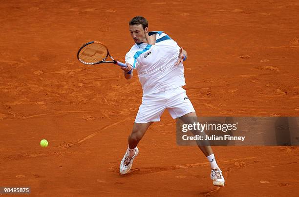 Juan Carlos Ferrero of Spain plays a forehand in his match against Rafael Nadal of Spain during day five of the ATP Masters Series at the Monte Carlo...