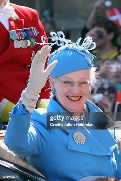 Queen Margrethe of Denmark waves to wellwishers from a carriage during celebrations marking her 70th birthday on April 16, 2010 in Copenhagen. Queen...