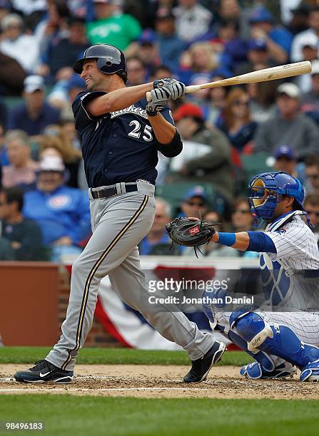 Starting pitcher Doug Davis of the Milwaukee Brewers hits the ball against the Chicago Cubs on Opening Day at Wrigley Field on April 12, 2010 in...