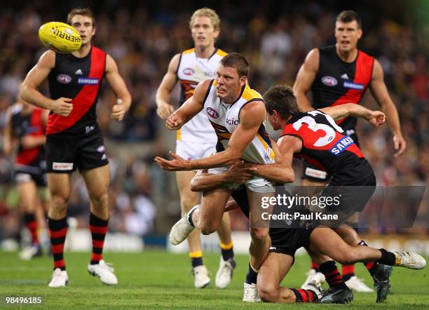 Brad Ebert of the Eagles handballs during the round four AFL match between the West Coast Eagles and the Essendon Bombers at Subiaco Oval on April...