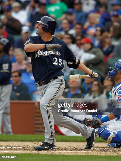 Starting pitcher Doug Davis of the Milwaukee Brewers hits the ball against the Chicago Cubs on Opening Day at Wrigley Field on April 12, 2010 in...