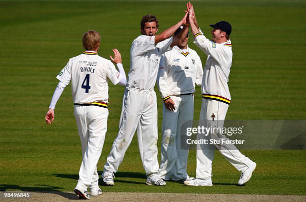 Durham bowler Liam Plunkett celebrates with team mates after takin the wicket of Essex batsman Jaic Mickleburgh during the 2nd day of the Division...