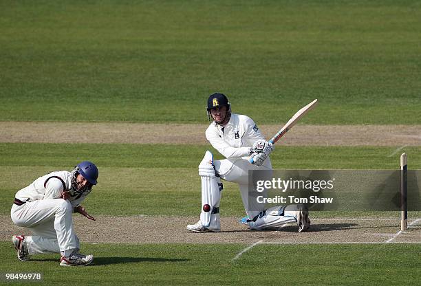 Rikki Clarke of Warwickshire hits out during the LV County Championship match between Lancashire and Warwickshire at Old Trafford on April 16, 2010...