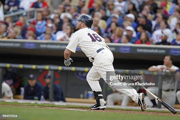 April 12: Jason Kubel of the Minnesota Twins watches the first home run ever at Target Field against the Boston Red Sox on April 12, 2010 in...