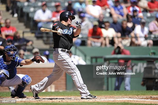 Travis Snider of the Toronto Blue Jays bats during the game against the Texas Rangers at Rangers Ballpark in Arlington in Arlington, Texas on...