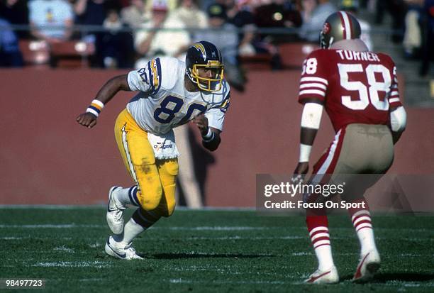 S: Tight End Kellen Winslow of the San Diego Chargers and linebacker Keena Turner of the San Francisco 49ers in action during an NFL football game at...