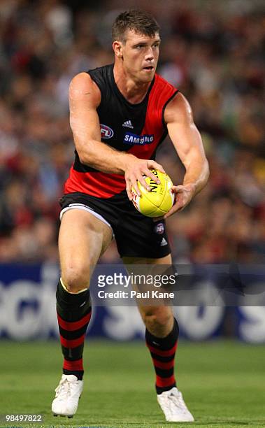 David Hille of the Bombers looks for a pass during the round four AFL match between the West Coast Eagles and the Essendon Bombers at Subiaco Oval on...
