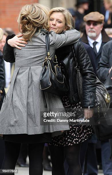 Emilia Fox hugs a friend at the funeral of Christopher Cazenove held at St Paul's Church in Covent Garden on April 16, 2010 in London, England.