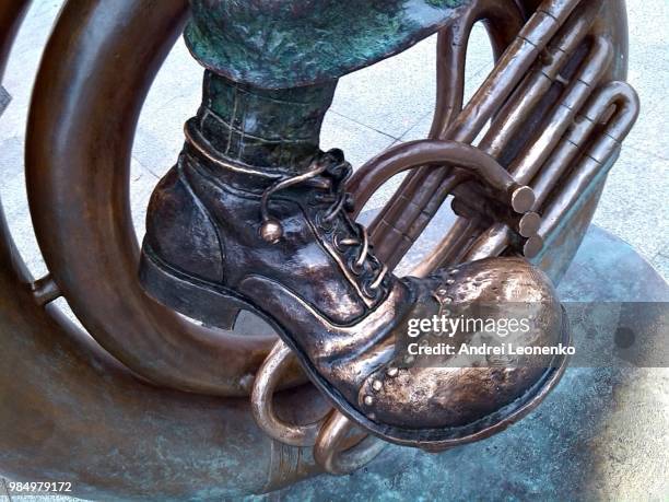 bronze boot - bronze boot stock pictures, royalty-free photos & images