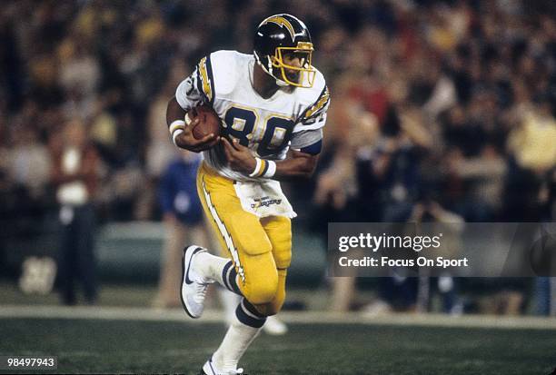 S: Tight End Kellen Winslow of the San Diego Chargers carries the ball against the Cincinnati Bengals circa early 1980's during an NFL football game...