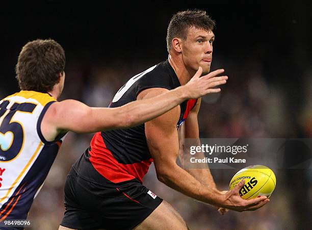 David Hille of the Bombers looks to handball during the round four AFL match between the West Coast Eagles and the Essendon Bombers at Subiaco Oval...