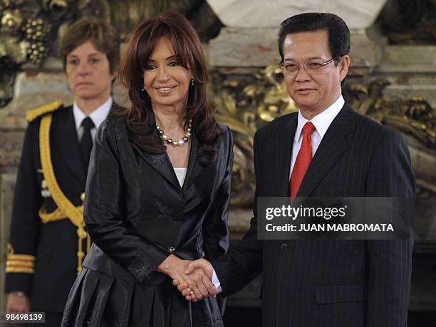 Vietnamese Prime Minister Nguyen Tan Dung and Argentine President Cristina Kirchner shake hands before a working meeting at the Government Palace in...