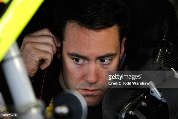 Paul Menard, driver of the Richmond/Menards Ford, sits in his car during practice for the NASCAR Nationwide Series O'Reilly Auto Parts 300 at Texas...