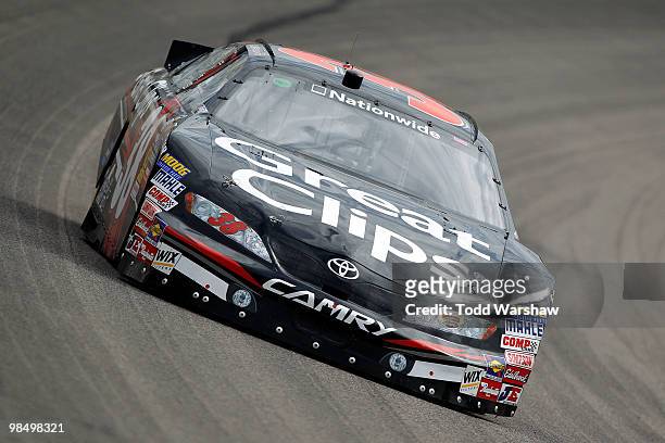 Jason Leffler drives the Great Clips Toyota during practice for the NASCAR Nationwide Series O'Reilly Auto Parts 300 at Texas Motor Speedway on April...