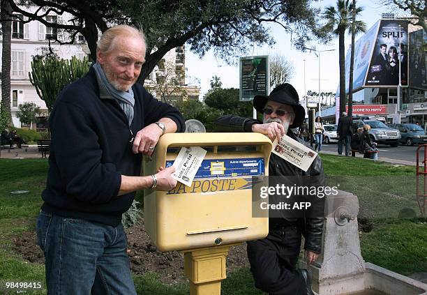 British actor Charles Dance and multi-million-selling author Terry Pratchett pose, posting a letter promoting "Going Postal" a television adaptation...