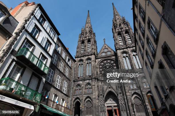 Clermont-Ferrand : 'rue des Gras' street in the town centre. In the middle, Clermont-Ferrand Cathedral , registered as a National Heritage Site,...