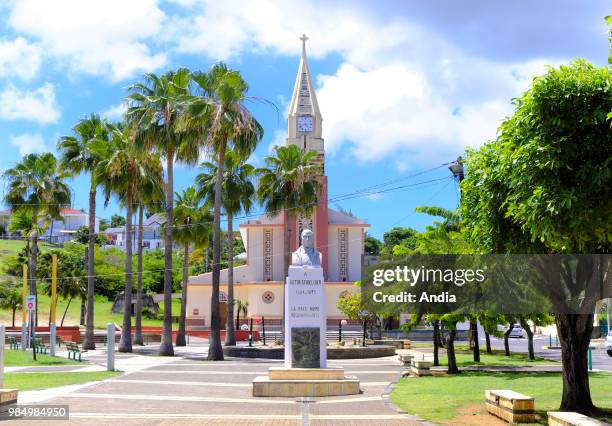 Guadeloupe, Sainte-Anne: the church and bust of Victor Schoelcher.