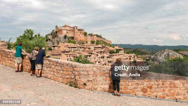 Alquezar, small restored medieval village surrounding a former monastery set high up on a rock spur of the Sierra de Guara, on the Rio Vero. Tourists...