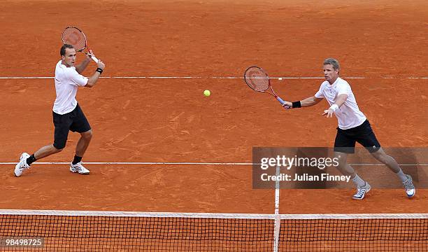 Mark Knowles of Bahamas and Bruno Soares of Brazil in action in their doubles match against Nenad Zimonjic of Serbia and Daniel Nestor of Canada...