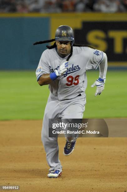 Manny Ramirez of the Los Angeles Dodgers runs to third base during a MLB game against the Florida Marlins at Sun Life Stadium on April 10, 2010 in...