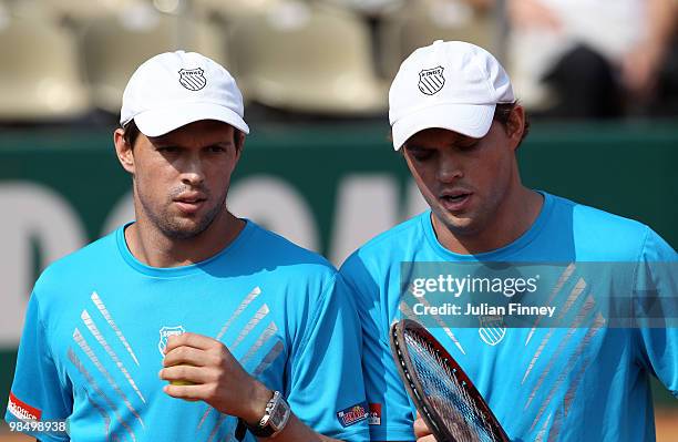 Bob Bryan and Mike Bryan of USA in their doubles match against Mahesh Bhupathi of India and Max Mirnyi of Belarus during day five of the ATP Masters...