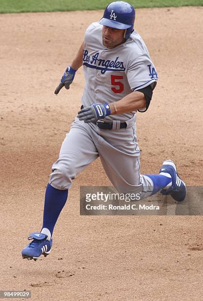 Reed Johnson of the Los Angeles Dodgers runs to third base during a MLB game against the Florida Marlins at Sun Life Stadium on April 11, 2010 in...