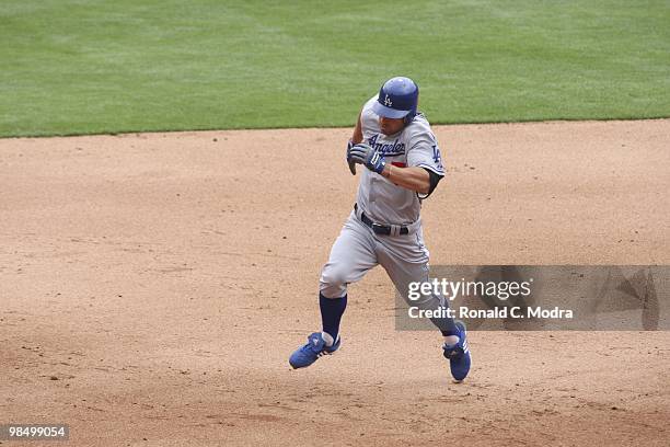 Reed Johnson of the Los Angeles Dodgers runs to third base during a MLB game against the Florida Marlins at Sun Life Stadium on April 11, 2010 in...