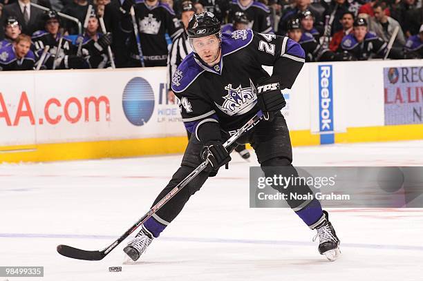 Alexander Frolov of the Los Angeles Kings skates with the puck against the Edmonton Oilers on April 10, 2010 at Staples Center in Los Angeles,...