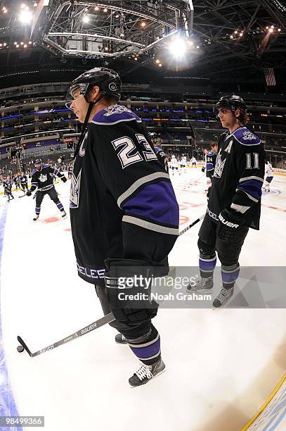 Dustin Brown and Anze Kopitar of the Los Angeles Kings warm up prior to the game against the Edmonton Oilers on April 10, 2010 at Staples Center in...