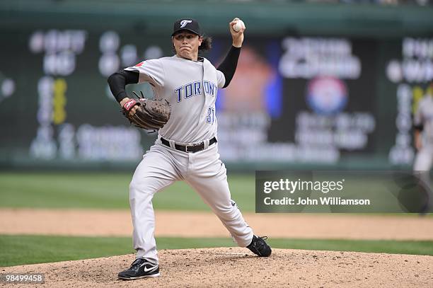 Scott Downs of the Toronto Blue Jays pitches during the game against the Texas Rangers at Rangers Ballpark in Arlington in Arlington, Texas on...