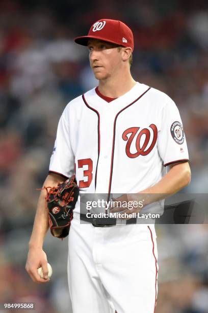 Erick Fedde of the Washington Nationals looks on during game two of a doubleheader against the New York Yankees at Nationals Park on June 18, 2018 in...