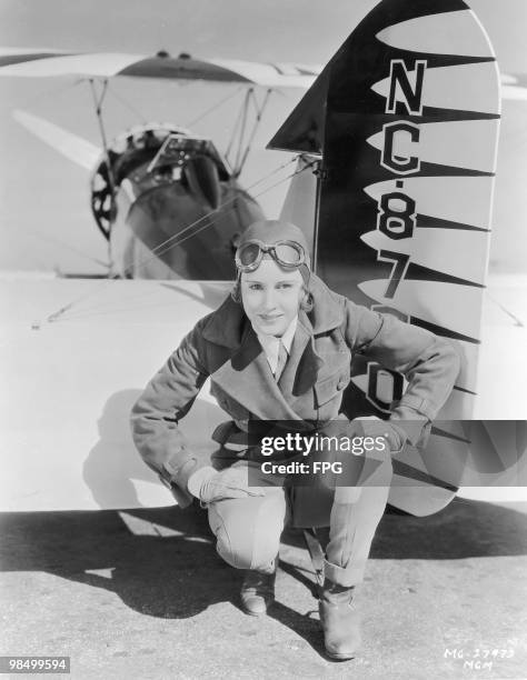 American actress and amateur pilot Madge Evans with an aircraft, circa 1935.