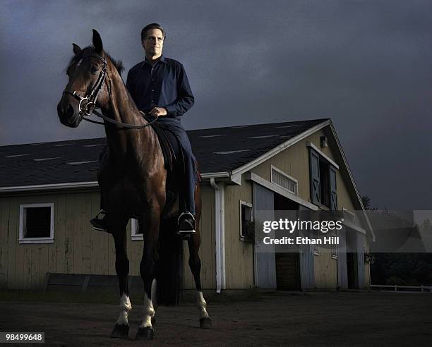 Former Governor of Massachusetts and politician, Mitt Romney riding one of his horses at a portrait session for Newsweek Magazine in Massachusetts in...