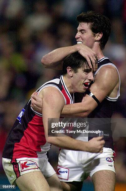 Stephen Milne for St Kilda is congratulated by team mate Lenny Hayes during the match between the Fremantle Dockers and the St Kilda, during round...