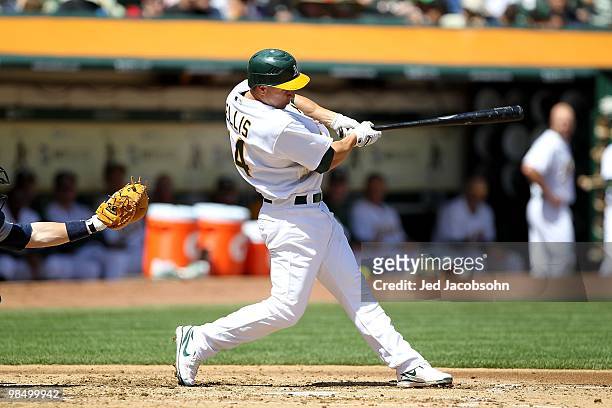 Mark Ellis of the Oakland Athletics bats against the Seattle Mariners during an MLB game at the Oakland-Alameda County Coliseum on April 8, 2010 in...