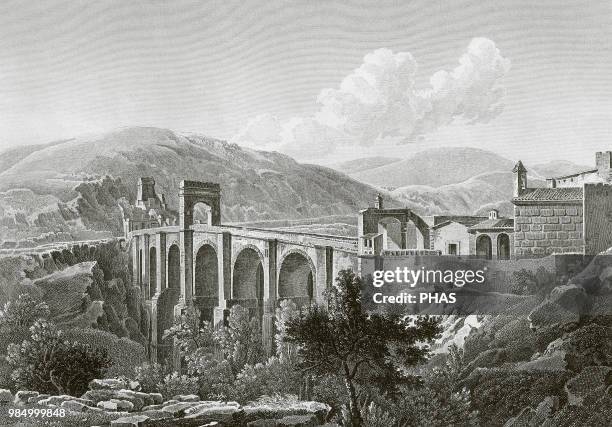 Spain. Extremadura. The Alcantara Bridge, also known as Trajan's Bridge at Alcantara. Roman stone arch bridge built over the Tagus River between...