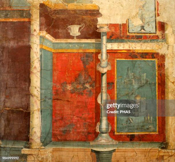 Roman fresco depicting an ediculo, of which only the column of the left is appreciated. Inside, columns imitating plant stems on a high podium,...