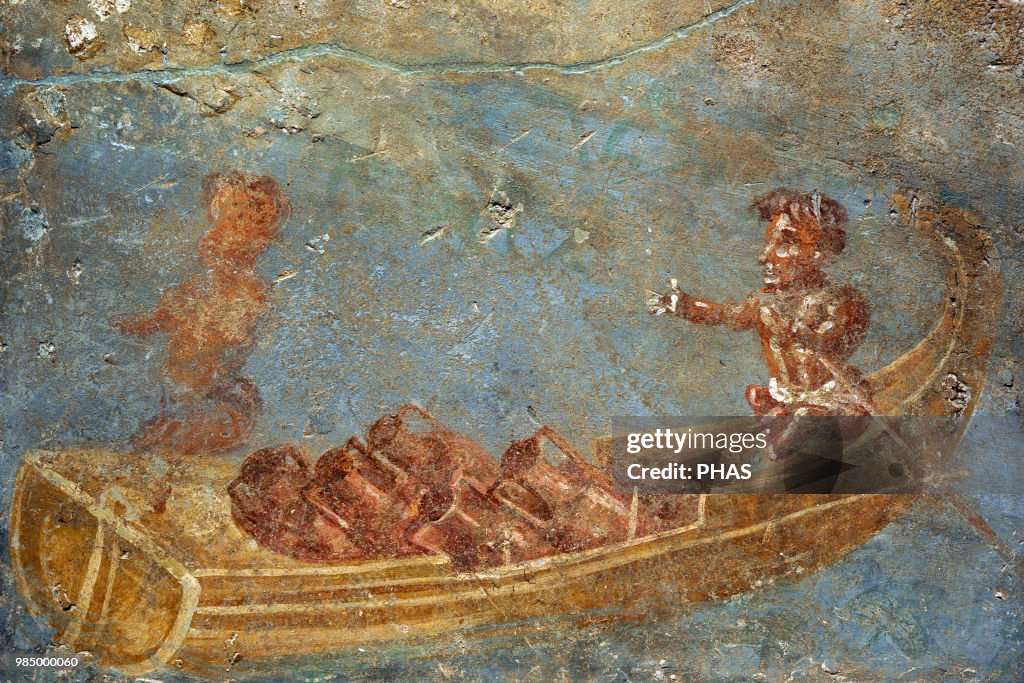 A Nilotic scene with pygmies in a boat loaded with amphorae.